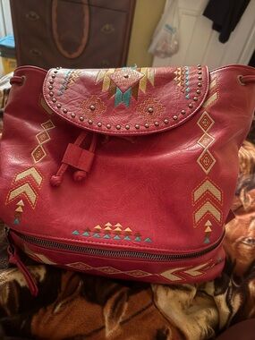Montana West embroidered Purse ( backpack) pink in color